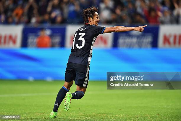 Hiroshi Kiyotake of Japan celebrates scoring his team's first goal during the international friendly match between Japan and Bosnia and Herzegovina...