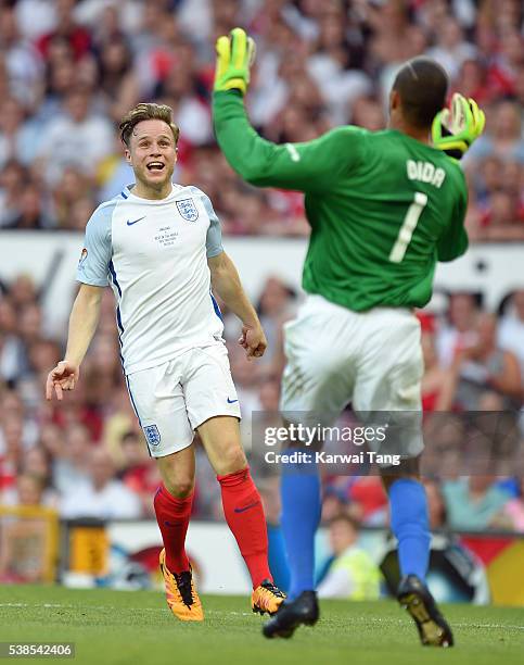 Olly Murs and Dida in action during Soccer Aid 2016 at Old Trafford on June 5, 2016 in Manchester, United Kingdom.