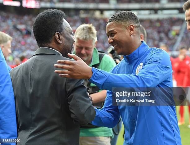 Pele meets Rickie Haywood-Williams during Soccer Aid 2016 at Old Trafford on June 5, 2016 in Manchester, United Kingdom.