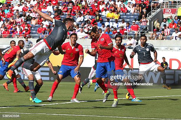 Celso Borges of Costa Rica heads the ball during the 2016 Copa America Centenario Group A match between Costa Rica and Paraguay at Camping World...