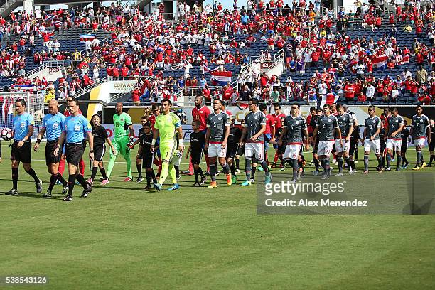 Players enter the pitch during the 2016 Copa America Centenario Group A match between Costa Rica and Paraguay at Camping World Stadium on June 4,...