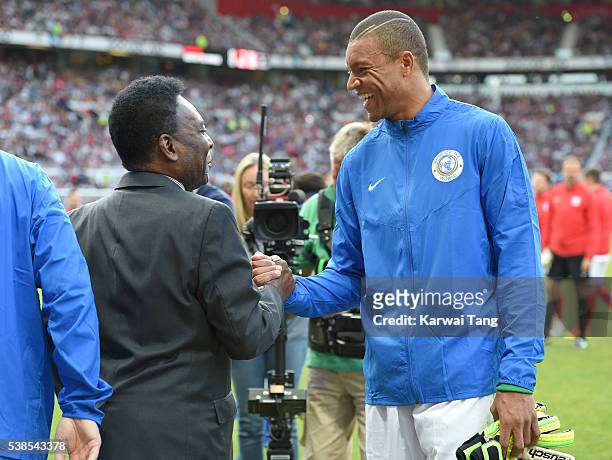 Pele meets Dida during Soccer Aid 2016 at Old Trafford on June 5, 2016 in Manchester, United Kingdom.