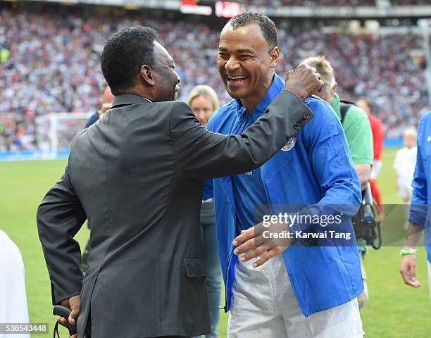 Pele meets Cafu during Soccer Aid 2016 at Old Trafford on June 5, 2016 in Manchester, United Kingdom.