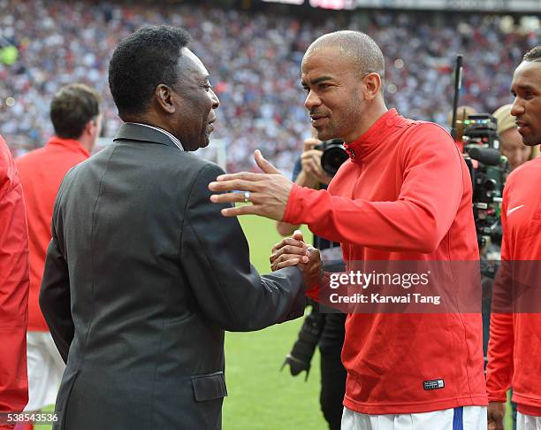 Pele meets Kieron Dyer during Soccer Aid 2016 at Old Trafford on June 5, 2016 in Manchester, United Kingdom.