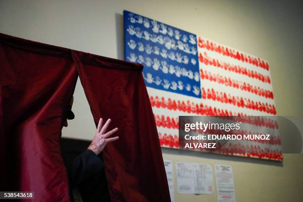 Man casts his ballot at polling station during New Jersey's primary elections on June 7, 2016 in Hoboken, New Jersey.