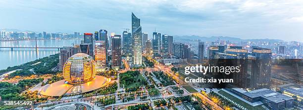 qianjiang new town (new cbd district) at dusk,hangzhou,china - hangzhou stock pictures, royalty-free photos & images