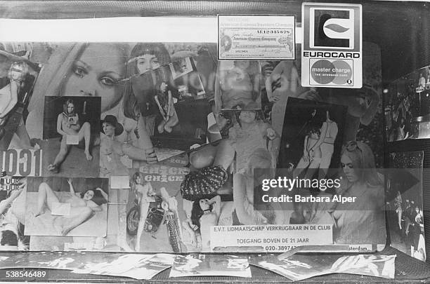 The window of the Carmen Club, a sex shop and film club in Amsterdam, Netherlands, 27th March 1978. The club accepts Master Charge , Eurocard and...