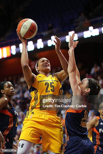 Marissa Coleman of the Indiana Fever shoots over Kelly Faris of the Connecticut Sun during the Indiana Fever Vs Connecticut Sun, WNBA regular season...