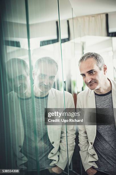 Director Olivier Assayas is photographed for Self Assignment on May 15, 2016 in Cannes, France.