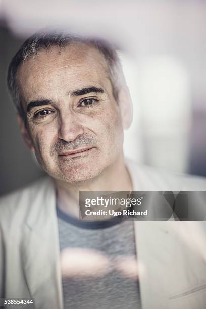 Director Olivier Assayas is photographed for Self Assignment on May 15, 2016 in Cannes, France.