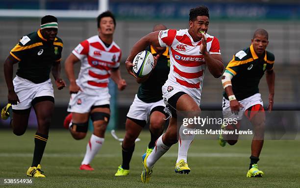 Ataata Moeakiola of Japan breaks clear to score a try during the World Rugby U20 Championship match between South Africa and Japan at The Academy...