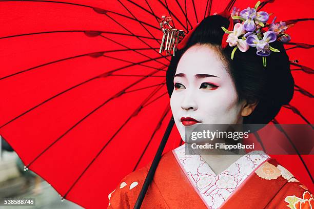 maiko girl portrait - geisha in training stock pictures, royalty-free photos & images