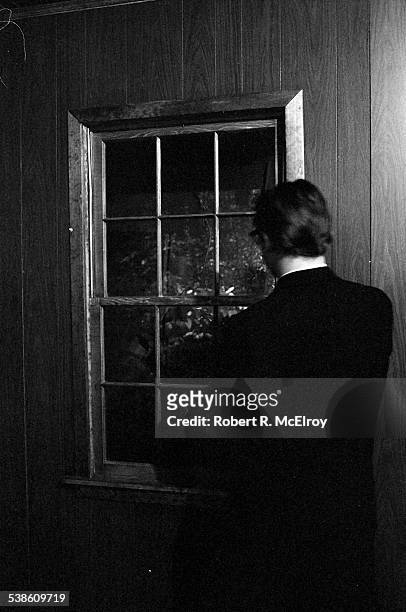 An unidentified man looks through a window installation during '9 Evenings: Theatre & Engineering,' New York, New York, between October 13 and 23,...