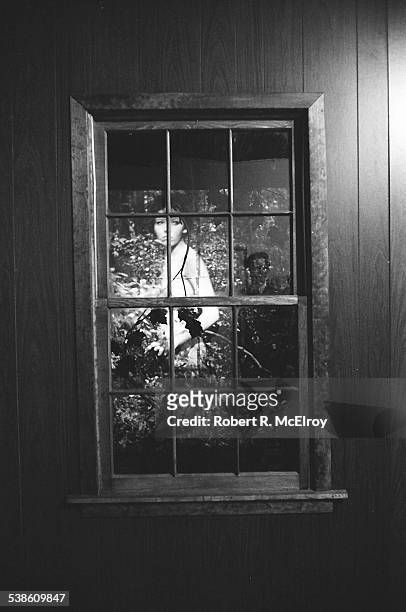 View of an unidentified, naked woman as seen through a window installation during '9 Evenings: Theatre & Engineering,' New York, New York, between...