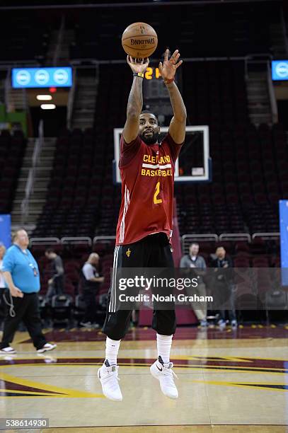 Kyrie Irving of the Cleveland Cavaliers shoots during practice and media availability as part of the 2016 NBA Finals on June 7, 2016 at Quickens...