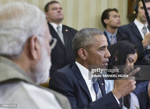 President Barack Obama speaks during a bilateral meeting in the Oval Office with India's Prime Minister Narendra Modi at the White House on June 7,...