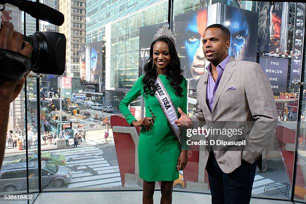 Calloway interviews Miss USA 2016 Deshauna Barber during her visit to "Extra" at their New York studios at H&M in Times Square on June 7, 2016 in New...