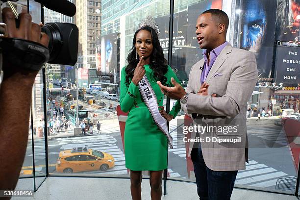 Calloway interviews Miss USA 2016 Deshauna Barber during her visit to "Extra" at their New York studios at H&M in Times Square on June 7, 2016 in New...