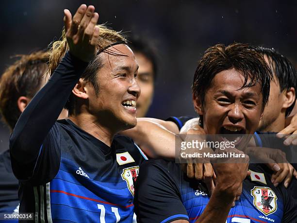 Takashi Usami and Hiroshi Kiyotake of Japan celebrate the first goal during the international friendly match between Japan and Bosnia And Herzegovina...