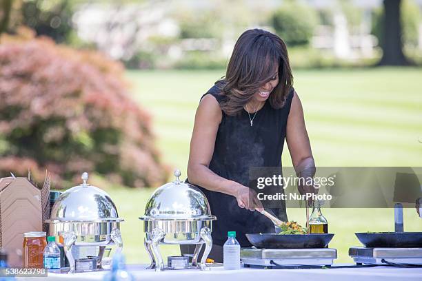 Washington, DC On Monday, June 6, on the South Lawn of the White House, First Lady Michelle Obama, prepares lunch made with vegetables she harvested...