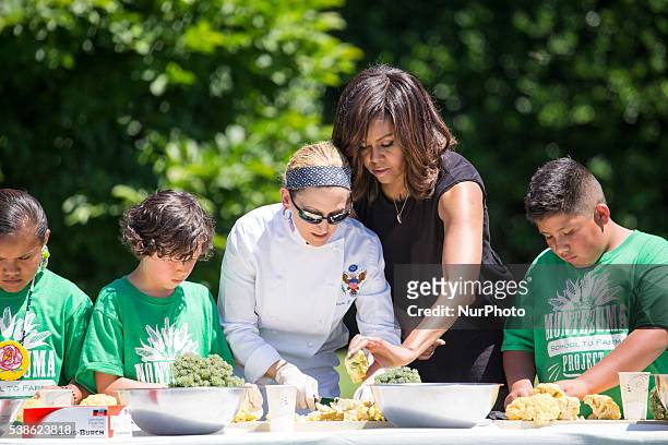 Washington, DC On Monday, June 6, on the South Lawn of the White House, First Lady Michelle Obama, and Susan Morrison, White House Executive Pastry...