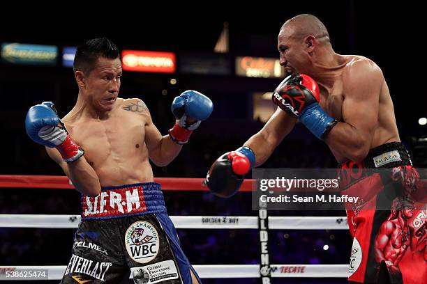 Orlando Salido throws a punch at Francisco Vargas during their WBC super featherweight championship bout at StubHub Center on June 4, 2016 in Carson,...