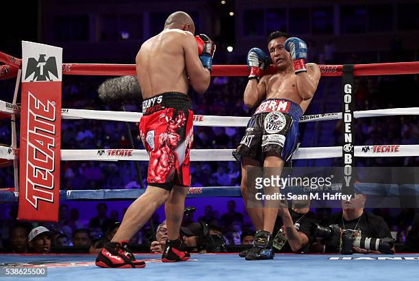 Orlando Salido forces Francisco Vargas into the ropes during their WBC super featherweight championship bout at StubHub Center on June 4, 2016 in...