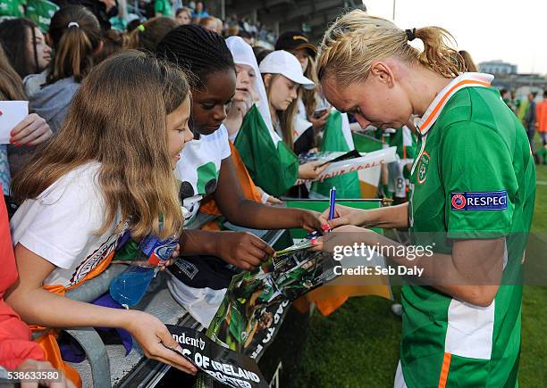 Dublin , Ireland - 7 June 2016; Stephanie Roche of Republic of Ireland sign posters for supporters following her team's victory in the Women's 2017...