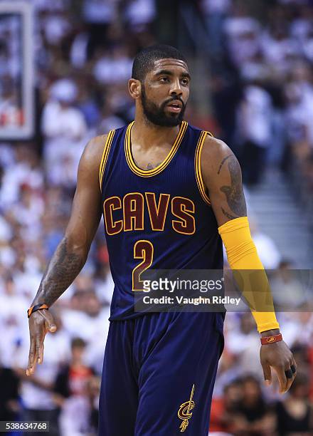 Kyrie Irving of the Cleveland Cavaliers looks on in the second half of Game Four of the Eastern Conference Finals against the Toronto Raptors during...