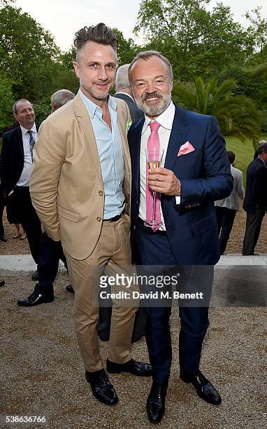 Roger Mele and Graham Norton attend The Bell Pottinger Summer Party at Lancaster House on June 7, 2016 in London, England.