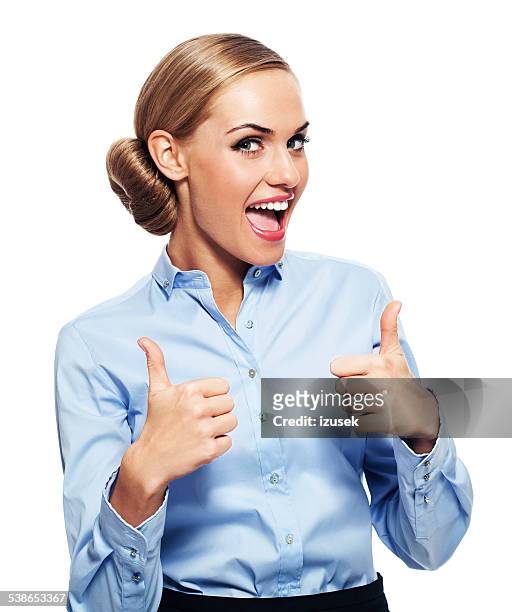excited businesswoman with thumbs up - woman thumb stock pictures, royalty-free photos & images