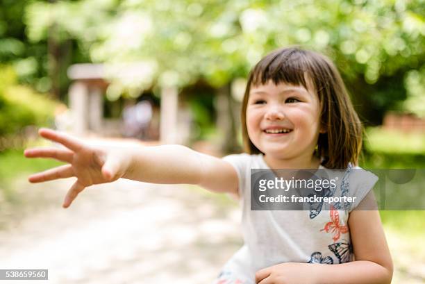 happiness japanese mixed race little girl portrait - giving a girl head stock pictures, royalty-free photos & images