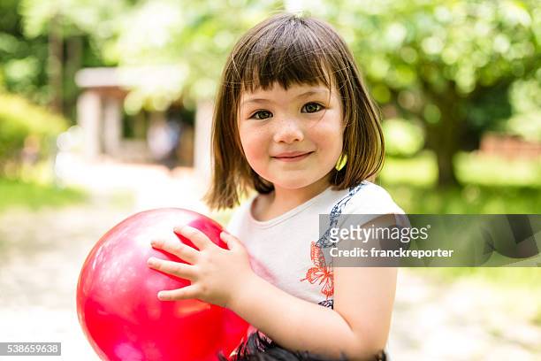 happiness japanese mixed race little girl portrait - two girls brown hair stock pictures, royalty-free photos & images