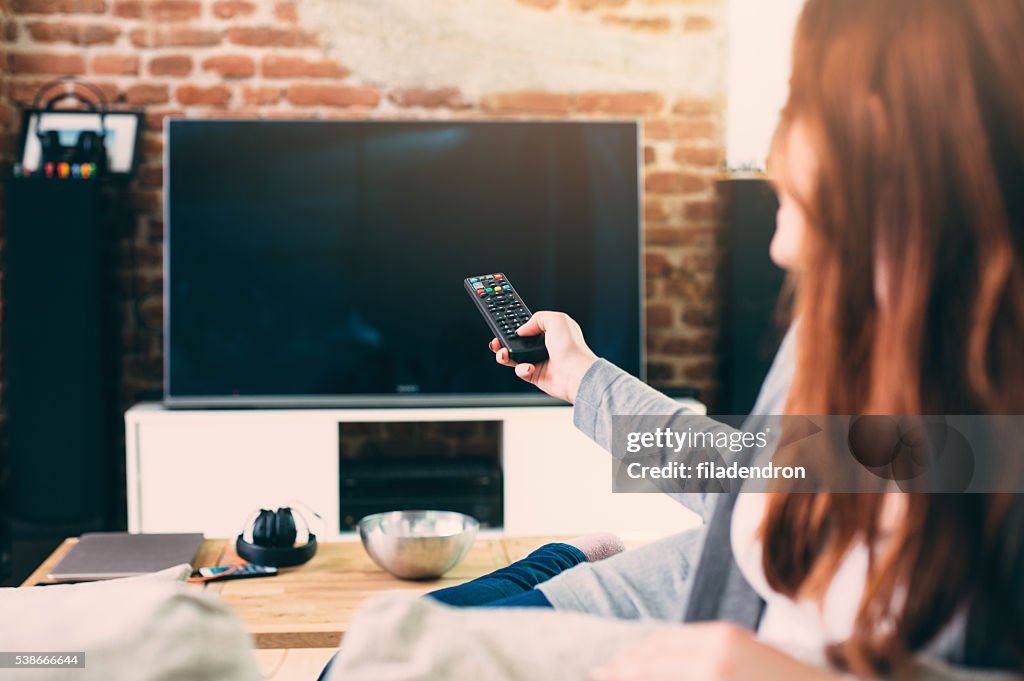 Woman watching TV