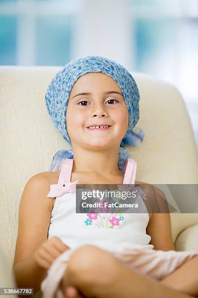 hopeful child with cancer - kids cancer smile stock pictures, royalty-free photos & images