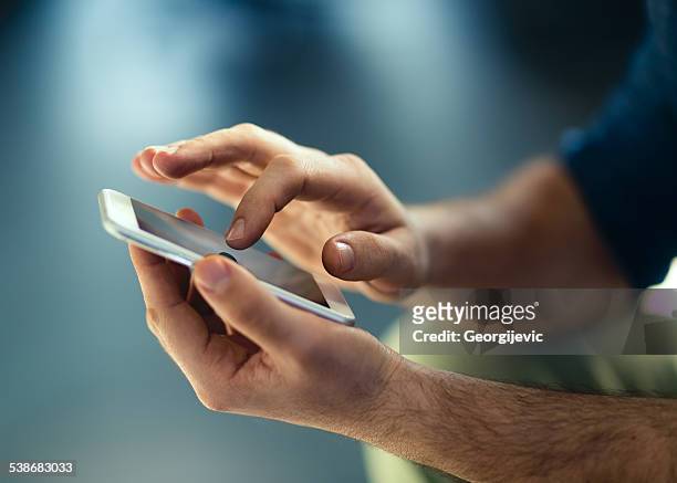 smartphone - human body part stock pictures, royalty-free photos & images