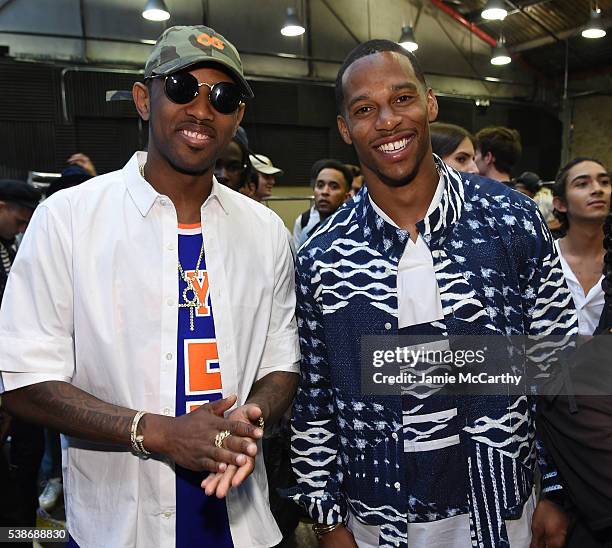 Fabolous and Victor Cruz attend Public School's Women's And Men's Spring 2017 Collection Runway Show at Cedar Lake on June 7, 2016 in New York City.