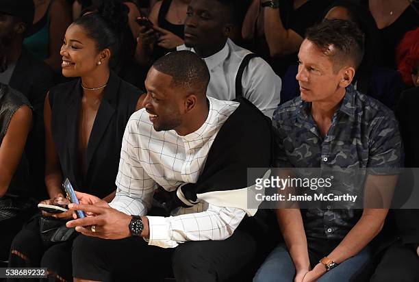 Actress Gabrielle Union, professional basketball player Dwyane Wade, and editor-in-chief of GQ Jim Nelson attend Public School's Women's And Men's...