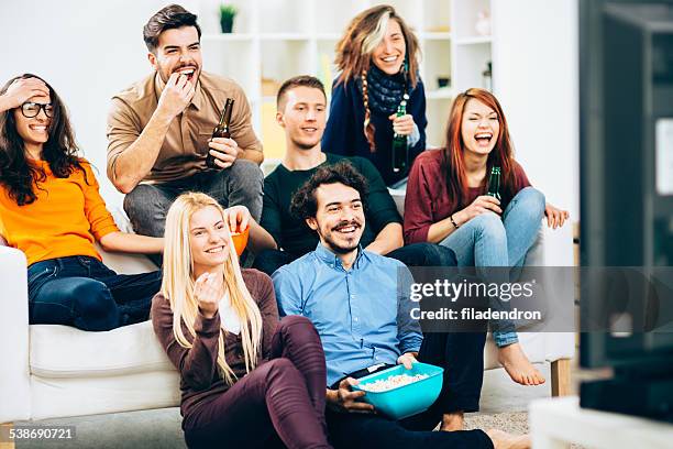 movie time - group video conference stock pictures, royalty-free photos & images