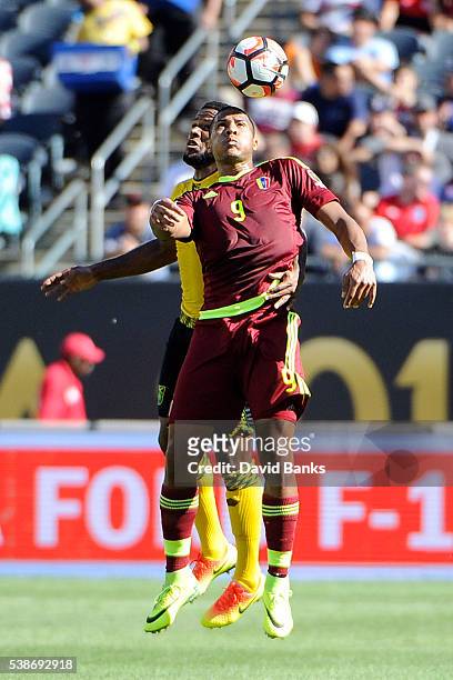 Jose Salomon Rondon of Venezuela heads the ball during a group C match between Jamaica and Venezuela at Soldier Field Stadium as part of Copa America...