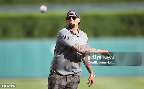 Former Detroit Tigers pitcher Joel Zumaya throws out the first pitch prior to the start of the game against the Toronto Blue Jays on June 7, 2016 at...