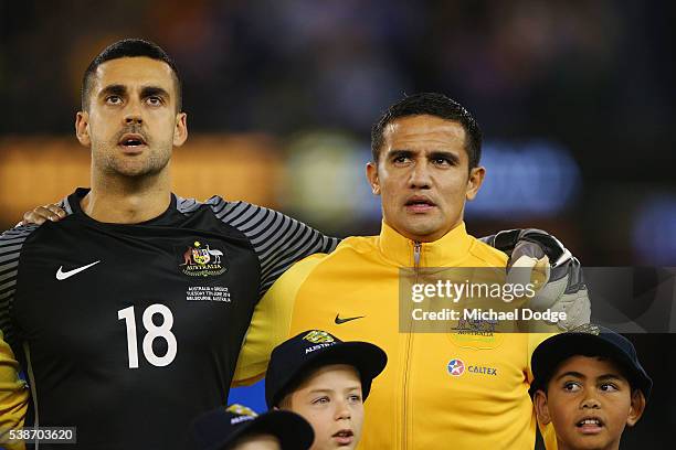 Socceroos goalkeeper Adam Federici and Tim Cahill sing the national anthem during the International Friendly match between the Australian Socceroos...