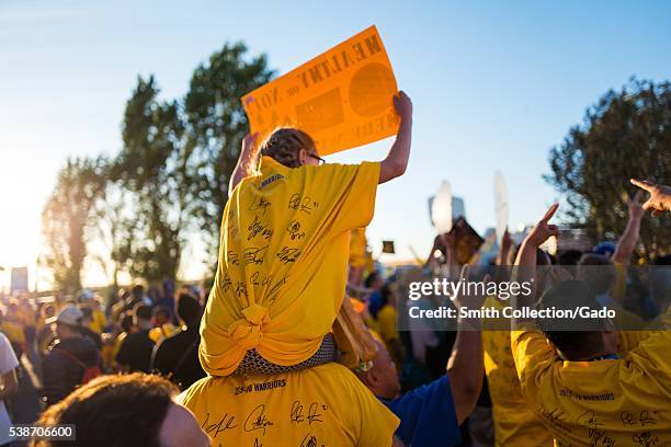 Following Game 2 of the National Basketball Association Finals between the Golden State Warriors and the Cleveland Cavaliers, a young fan of the...