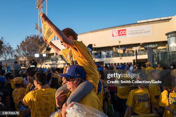 Following Game 2 of the National Basketball Association Finals between the Golden State Warriors and the Cleveland Cavaliers, a young fan of the...