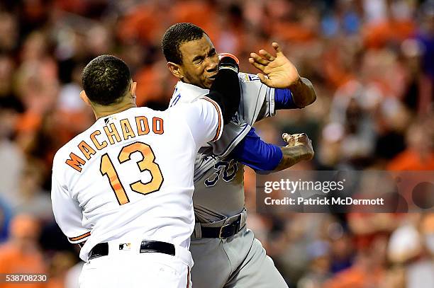 Manny Machado of the Baltimore Orioles and Yordano Ventura of the Kansas City Royals fight in the fifth inning during a MLB baseball game at Oriole...