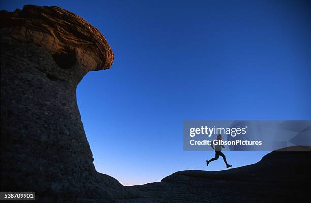 trail running girl - alberta badlands stock pictures, royalty-free photos & images