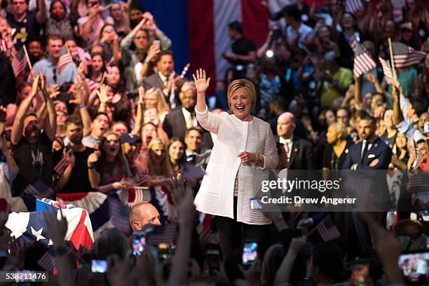 Democratic presidential candidate Hillary Clinton arrives onstage during a primary night rally at the Duggal Greenhouse in the Brooklyn Navy Yard,...