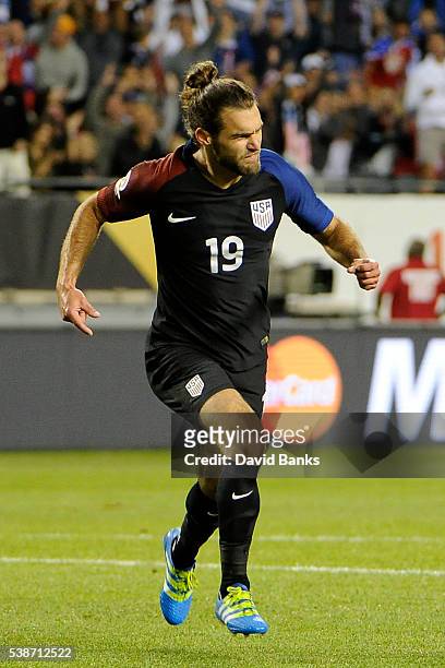 Graham Zusi of United States celebrates after scoring the fourth goal of his team during a group A match between United States and Costa Rica at...