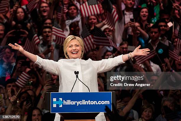 Democratic presidential candidate Hillary Clinton arrives onstage during a primary night rally at the Duggal Greenhouse in the Brooklyn Navy Yard,...