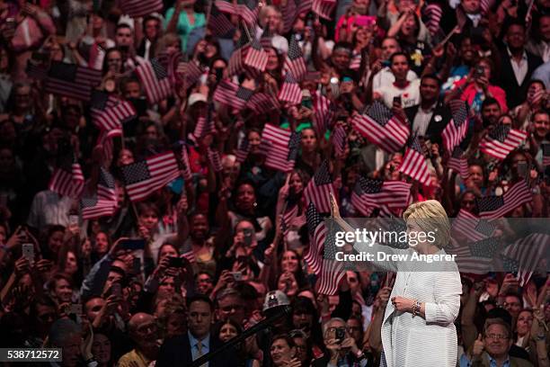 Democratic presidential candidate Hillary Clinton arrives onstage during a primary night rally at the Duggal Greenhouse in the Brooklyn Navy Yard,...